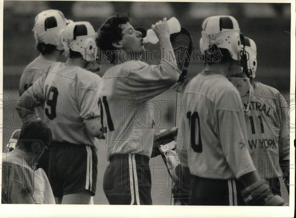 1984 Press Photo Central New York lacrosse player John McAuliffe drinks water- Historic Images