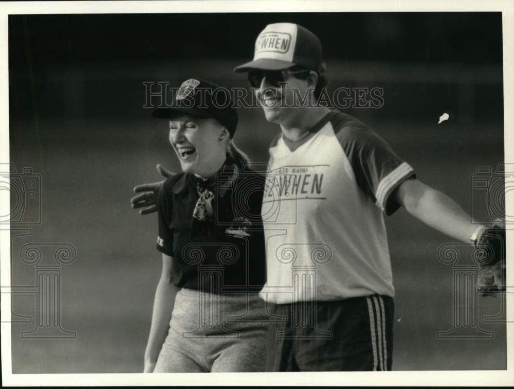 Press Photo Softball player Joyce Kszystyniak of Fulton jokes with 1st baseman- Historic Images