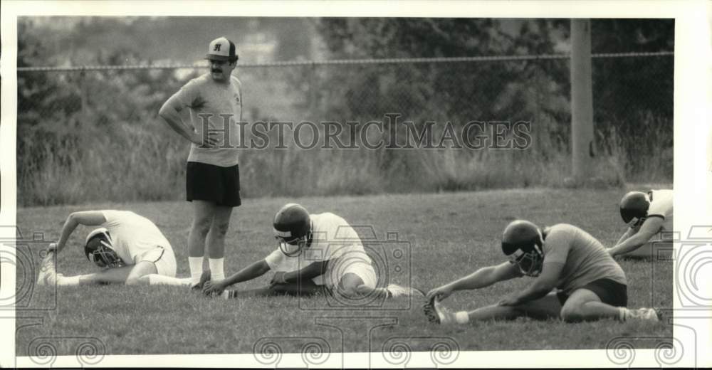 1985 Press Photo Henninger High School Football Watches Over Players- Historic Images