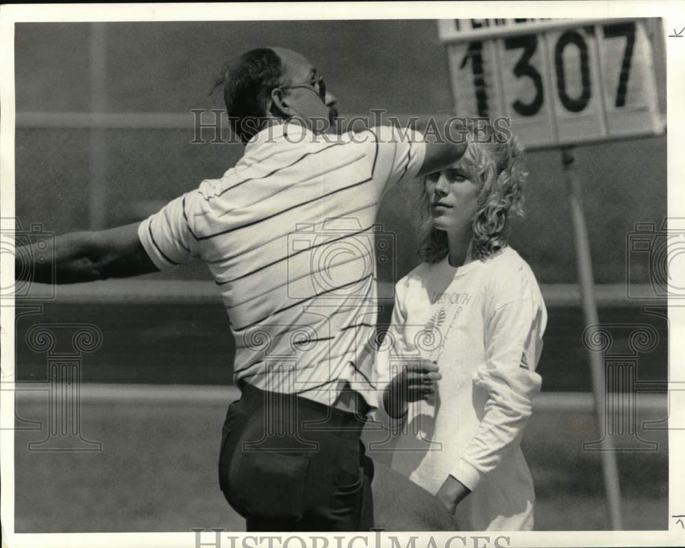 1987 Press Photo Coach Kevin Carriero helps Jill Pedersen at Empire State Games- Historic Images