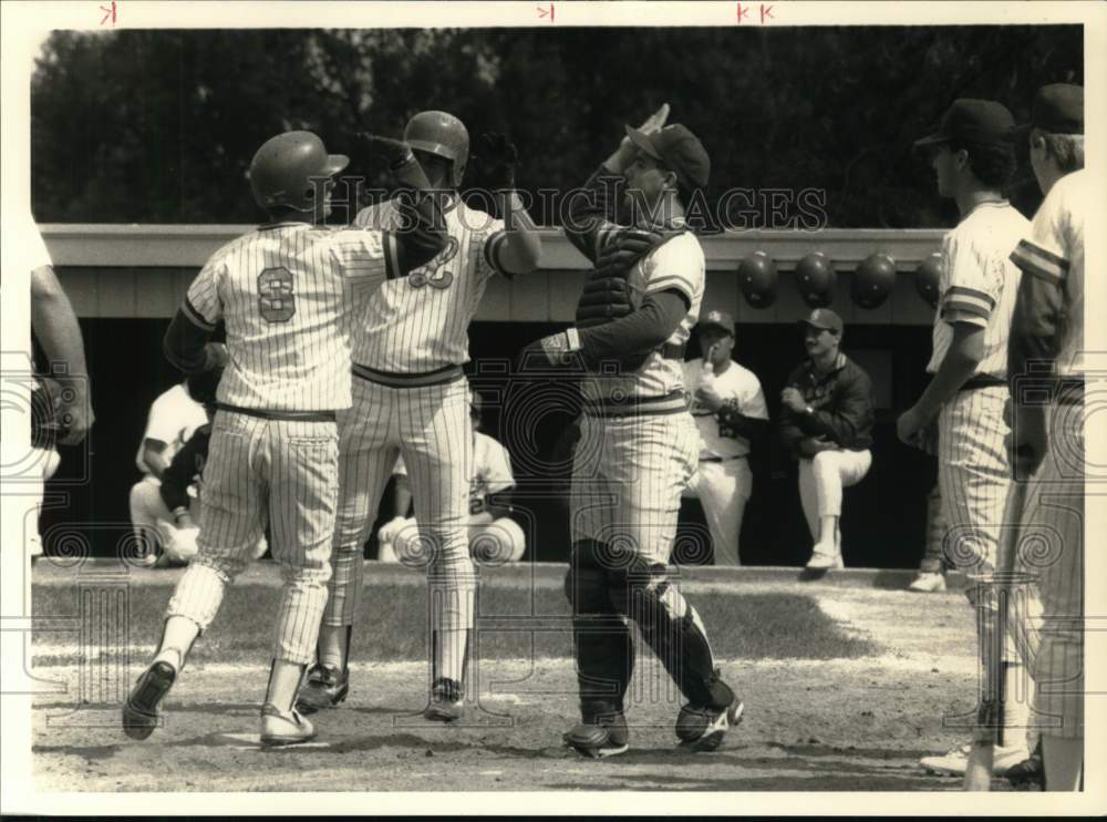1988 Press Photo LeMoyne College Baseball Players congratulate after Play- Historic Images