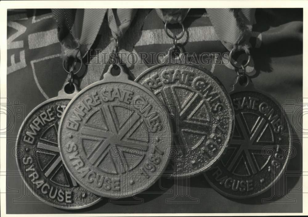 1987 Press Photo Empire State Games of Syracuse Medals in Close Up - sys08372- Historic Images