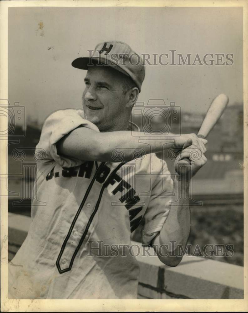 Press Photo US Hoffman softball player James Garvey poses with bat by fence- Historic Images