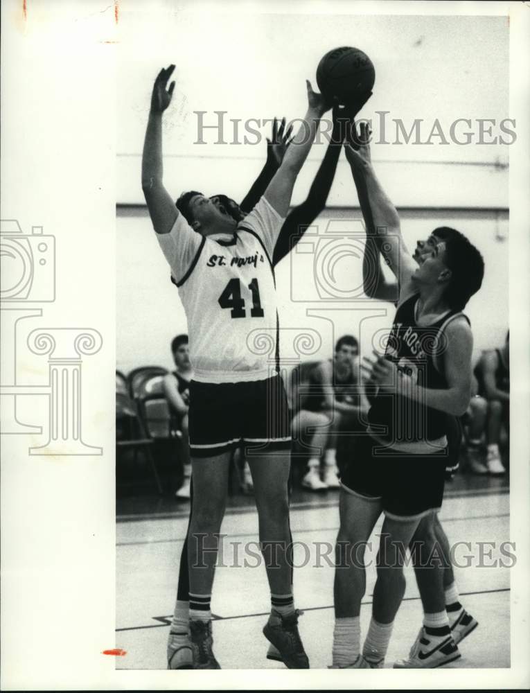 1987 Press Photo St Mary basketball player Scott Lorraine battles St Rose's #52- Historic Images