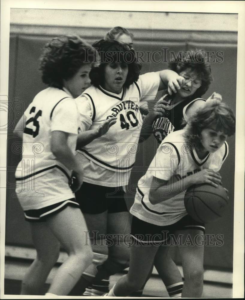 Press Photo DeRuyter basketball players block shot of Madison&#39;s C Hayward #31- Historic Images