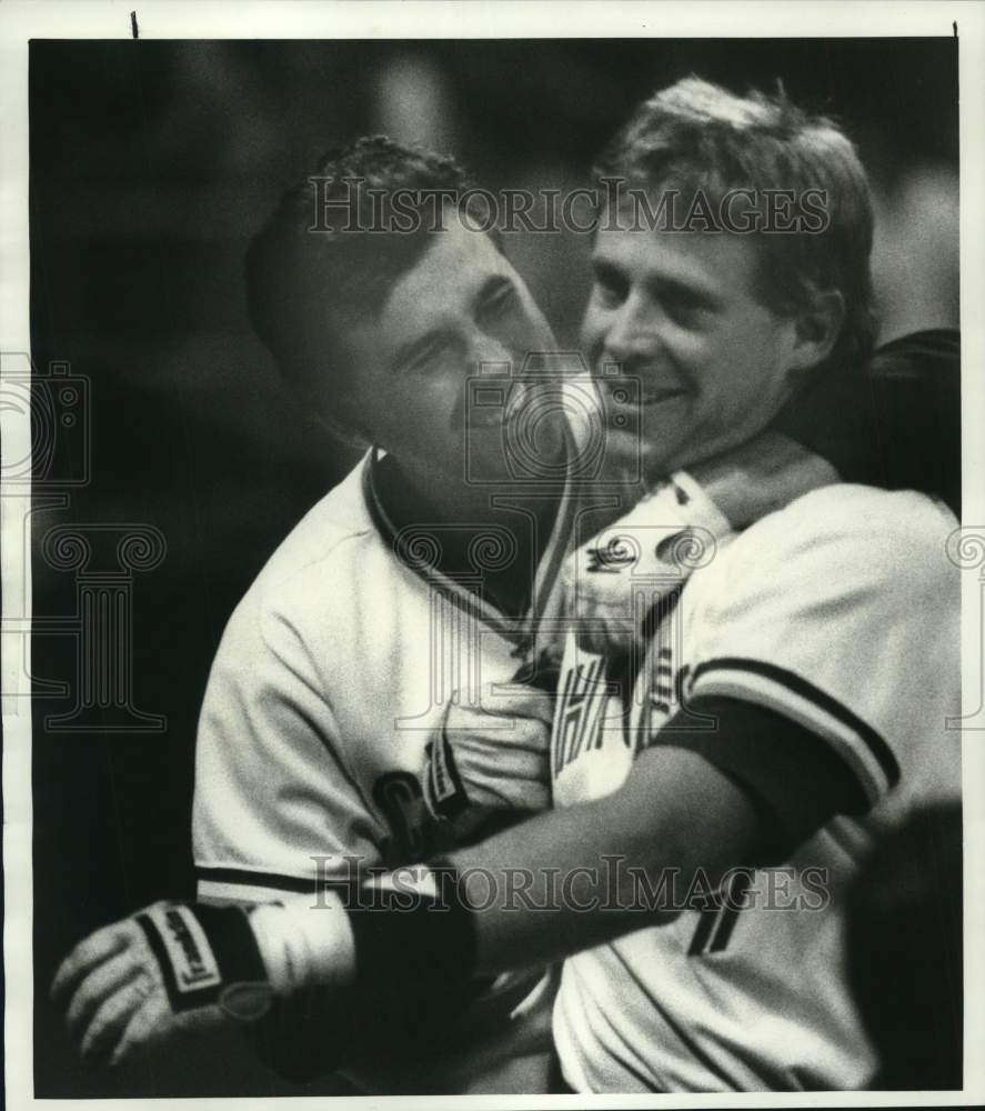 1987 Press Photo Syracuse Chiefs baseball player Joe Castro hugged by teammate- Historic Images