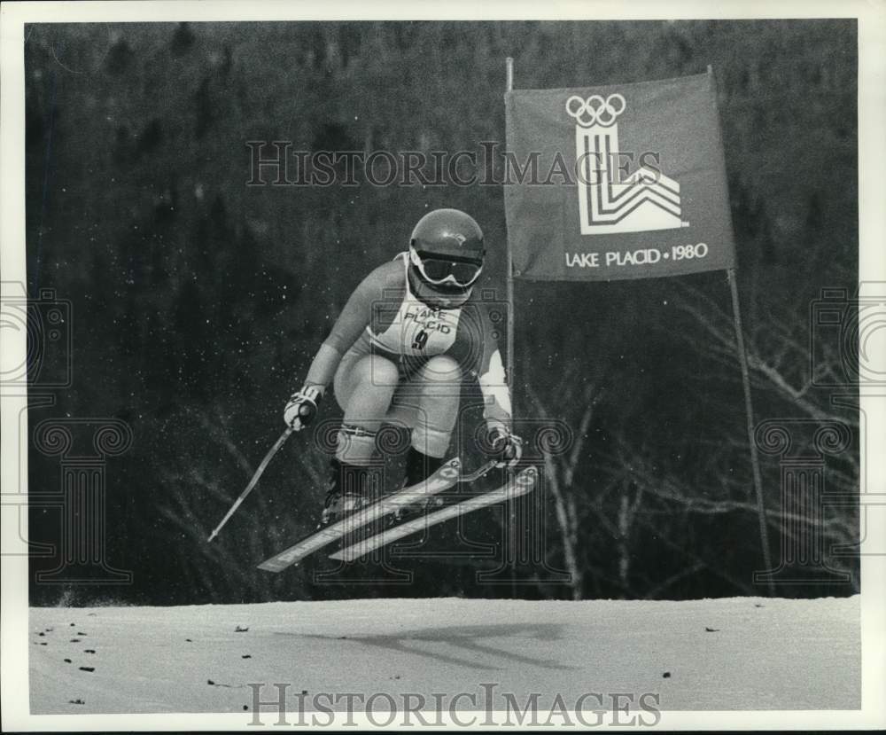 1980 Press Photo Downhill skier Viki Fleckenstein goes airborne during Olympics- Historic Images