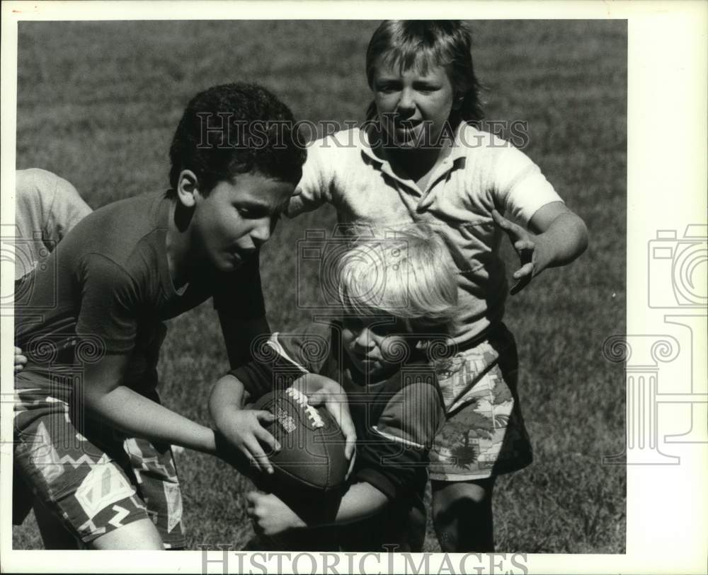 Press Photo Young boys playing football at Lincoln Park, Auburn New York- Historic Images