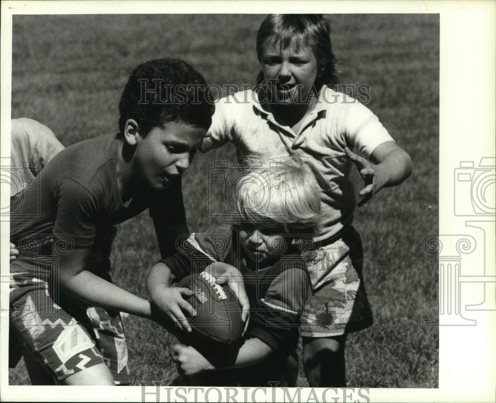Press Photo Young boys playing football at Lincoln Park, Auburn New York- Historic Images