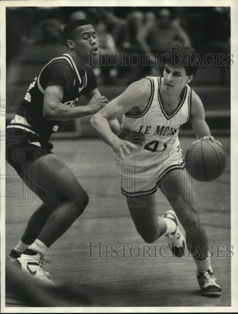 1987 Press Photo LeMoyne College basketball player Scott Hicks drives by Fields- Historic Images