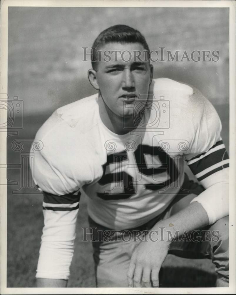 Press Photo Syracuse University football player Mike Bill kneels down for photo- Historic Images