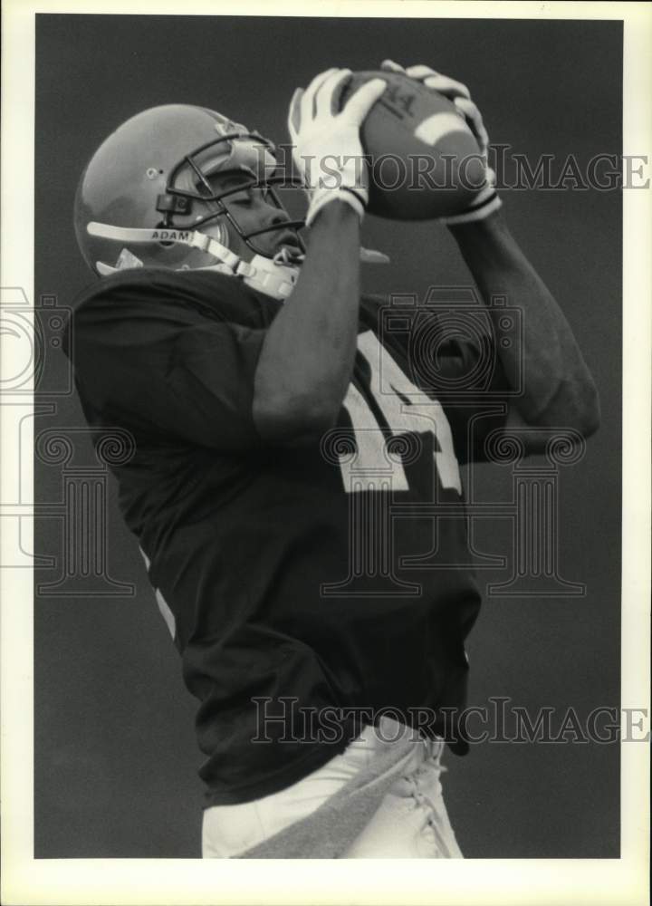 1989 Press Photo Football player Rob Moore during practice- Historic Images