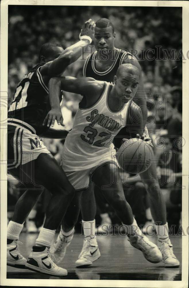 1989 Press Photo Syracuse basketball player Stephen Thompson vs. Michigan- Historic Images