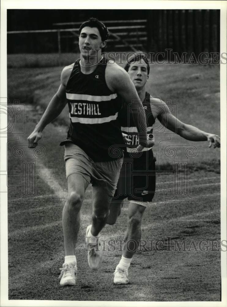 1990 Press Photo Kevin Caavant hands off to Casey Mastine at Westhill High Track- Historic Images