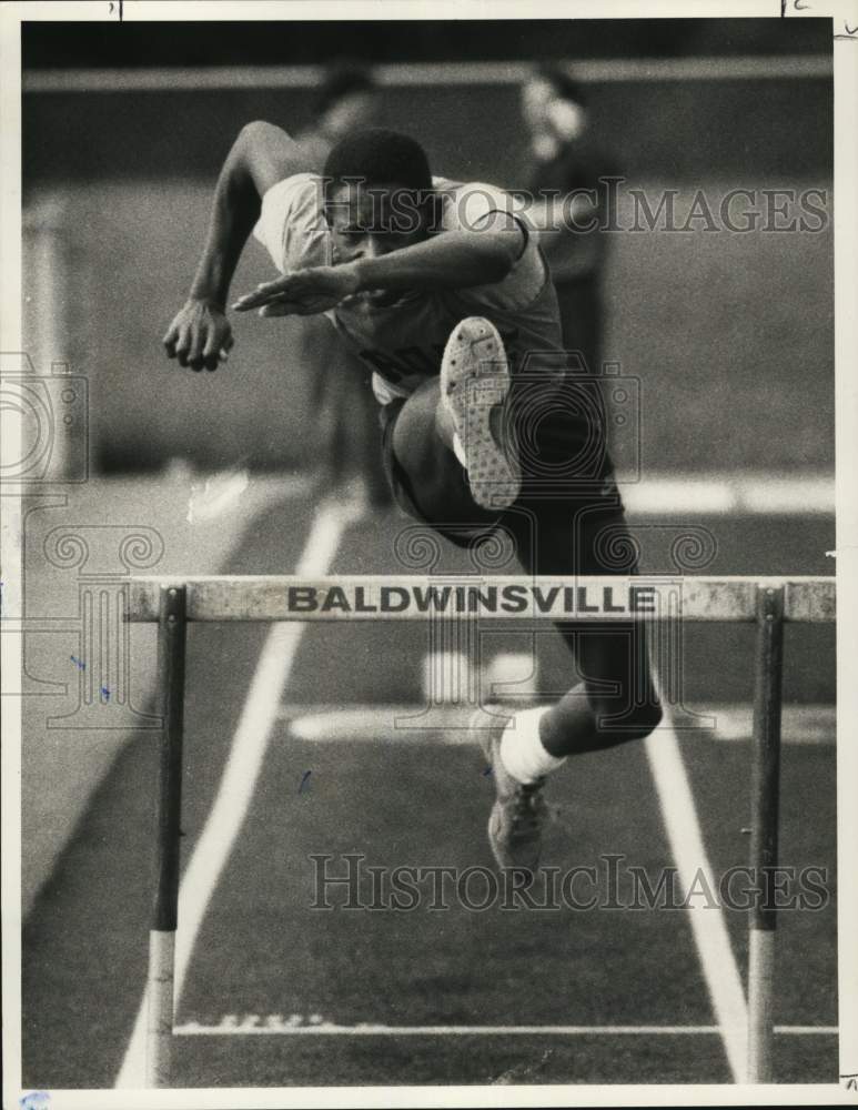 Press Photo Rome High Runner Steve Cardwell Jumps Hurdle at Baldwinsville- Historic Images