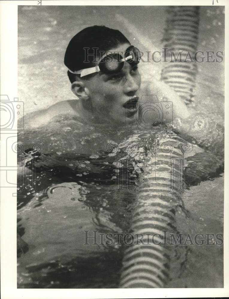 1988 Press Photo Nick Jensen swims 200 I.M. at swim meet at W. Genesee High- Historic Images