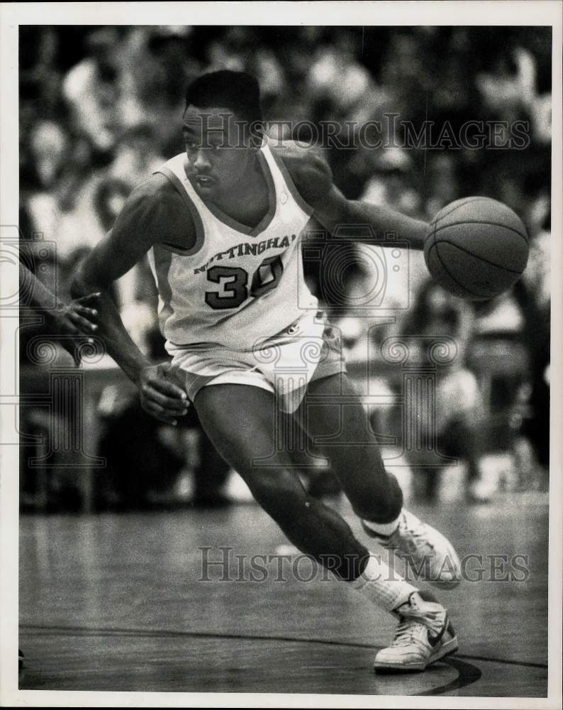 1988 Press Photo Nottingham&#39;s Burnell Reid driving for basket at Nottingham High- Historic Images