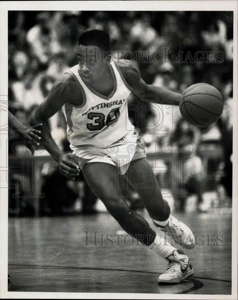 1988 Press Photo Nottingham's Burnell Reid driving for basket at Nottingham High- Historic Images