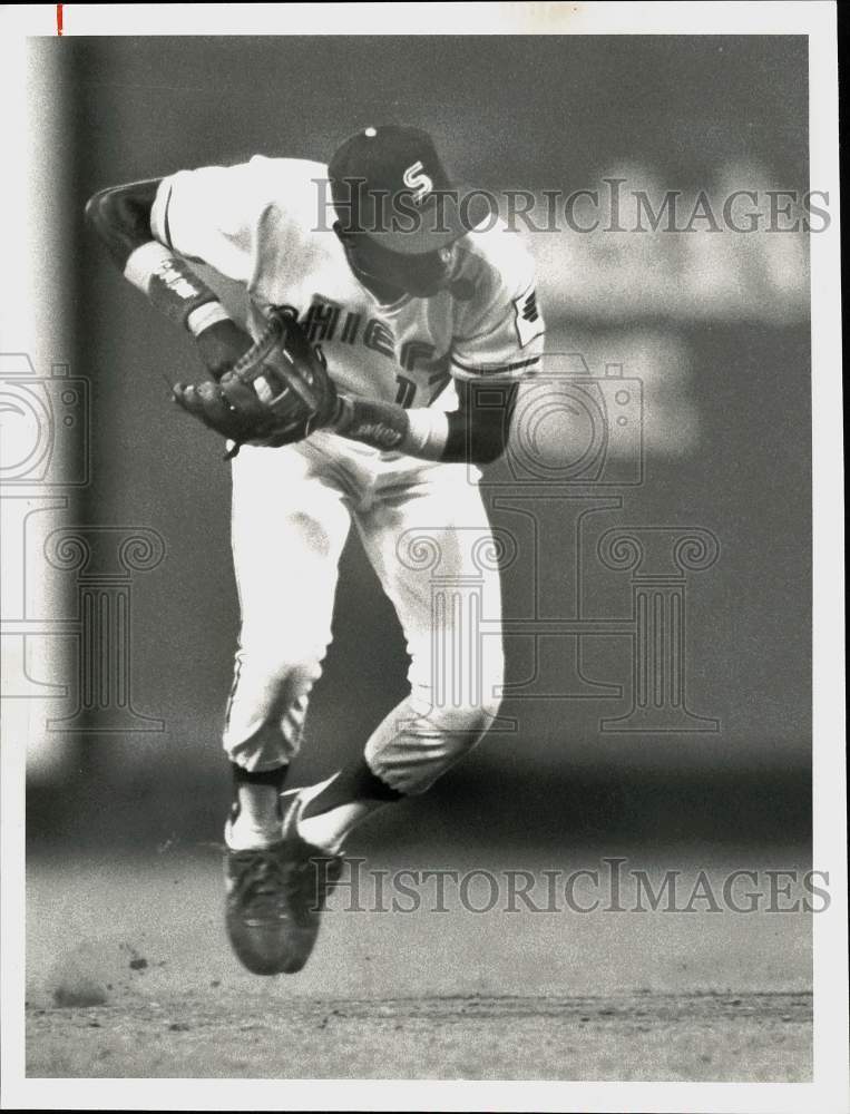 Press Photo Eric Yelding, Chiefs shortstop, hops before launching baseball.- Historic Images