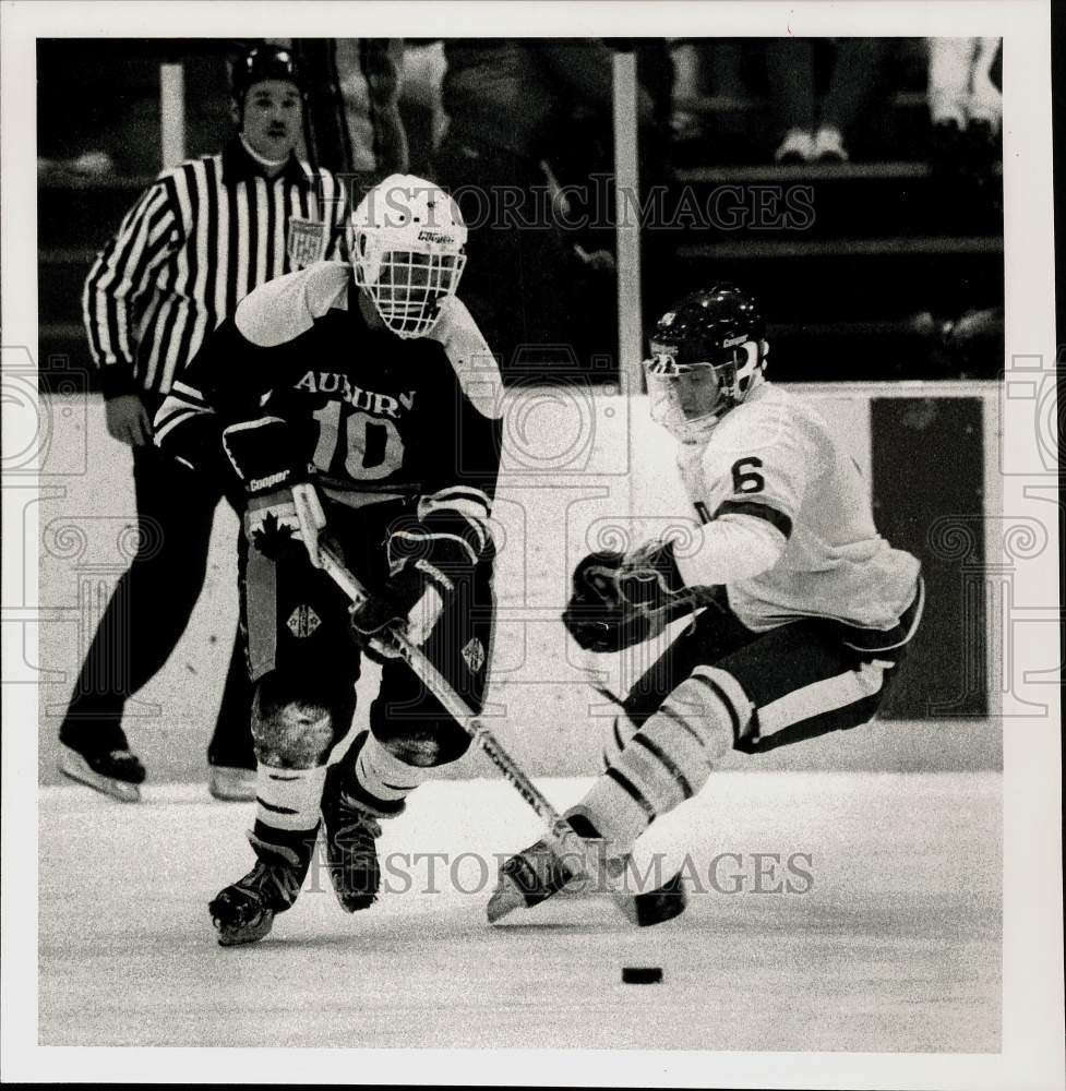 1989 Press Photo Auburn vs. West Genesee in hockey game action. - sys16158- Historic Images