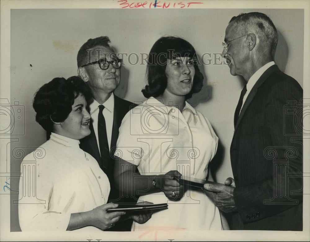 1964 Press Photo Russell Sage College president congratulates medical graduates