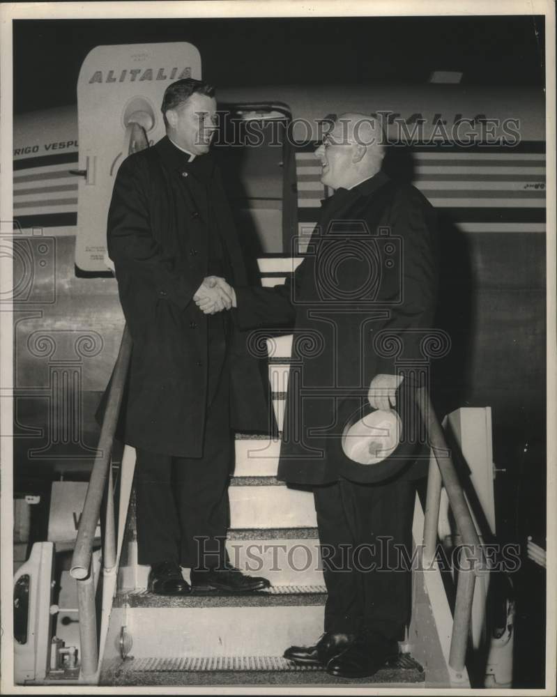 Load image into Gallery viewer, 1966 Press Photo Rt. Reverend Monsignor John G. Nolan boarding Alitalia plane
