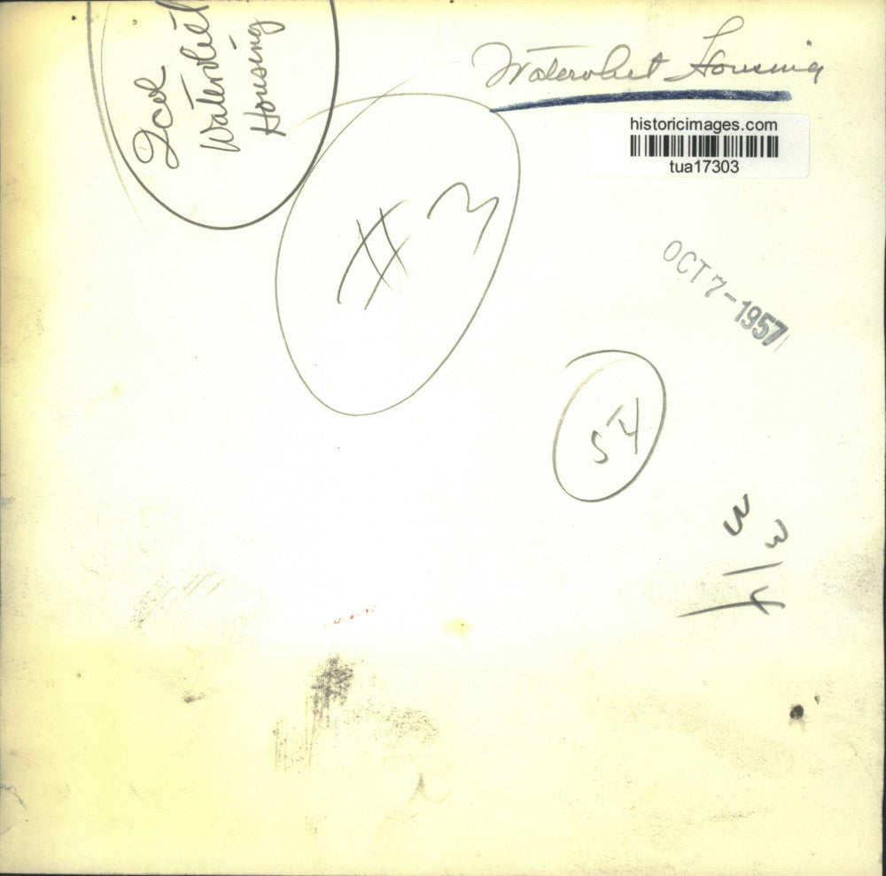 1957 Press Photo View of alley through broken window in Watervliet, New York