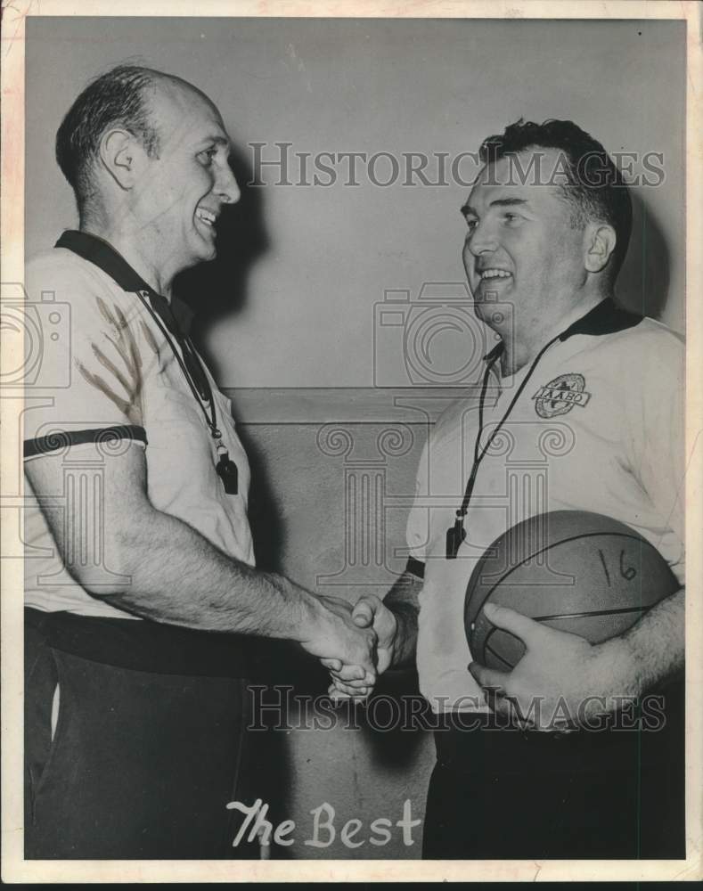 1966 Press Photo Hugo Pellischi and Rod O&#39;Connor (holding basketball) shake hand- Historic Images