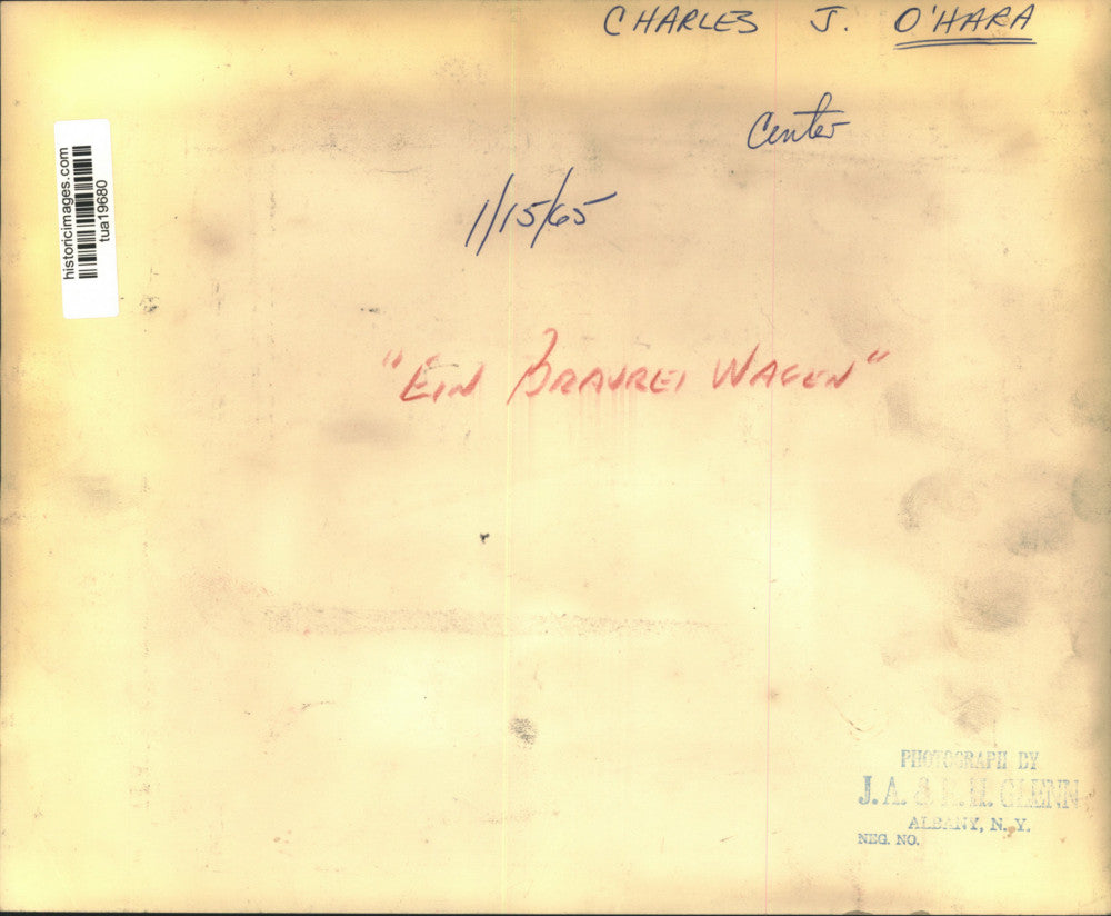 1965 Press Photo Group shows off model of German brewery wagon in New York