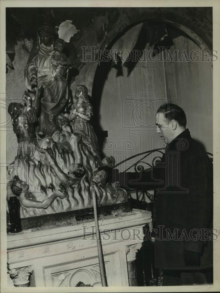 1961 Press Photo Rev Emery Parillo of Our Lady of Mt Carmel inspects fire damage