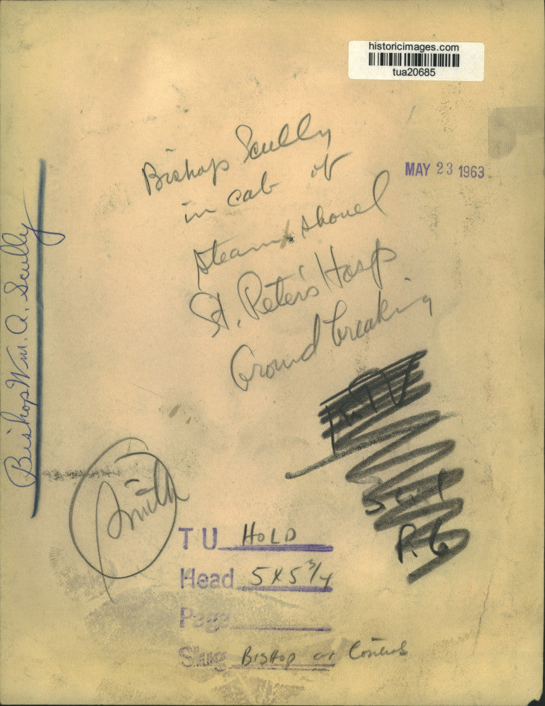 1963 Press Photo Bishop William A Scully, operates cab of steam shovel