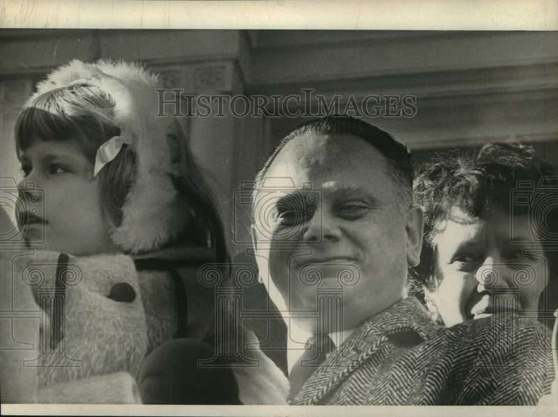 Load image into Gallery viewer, 1967 Press Photo Michael Liuni with young girl and woman standing behind him
