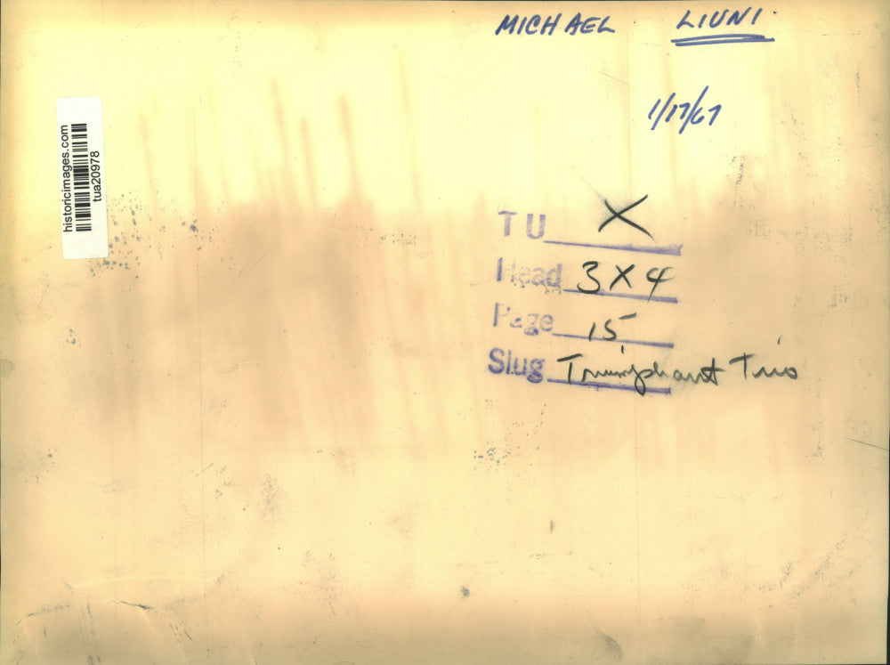 1967 Press Photo Michael Liuni with young girl and woman standing behind him