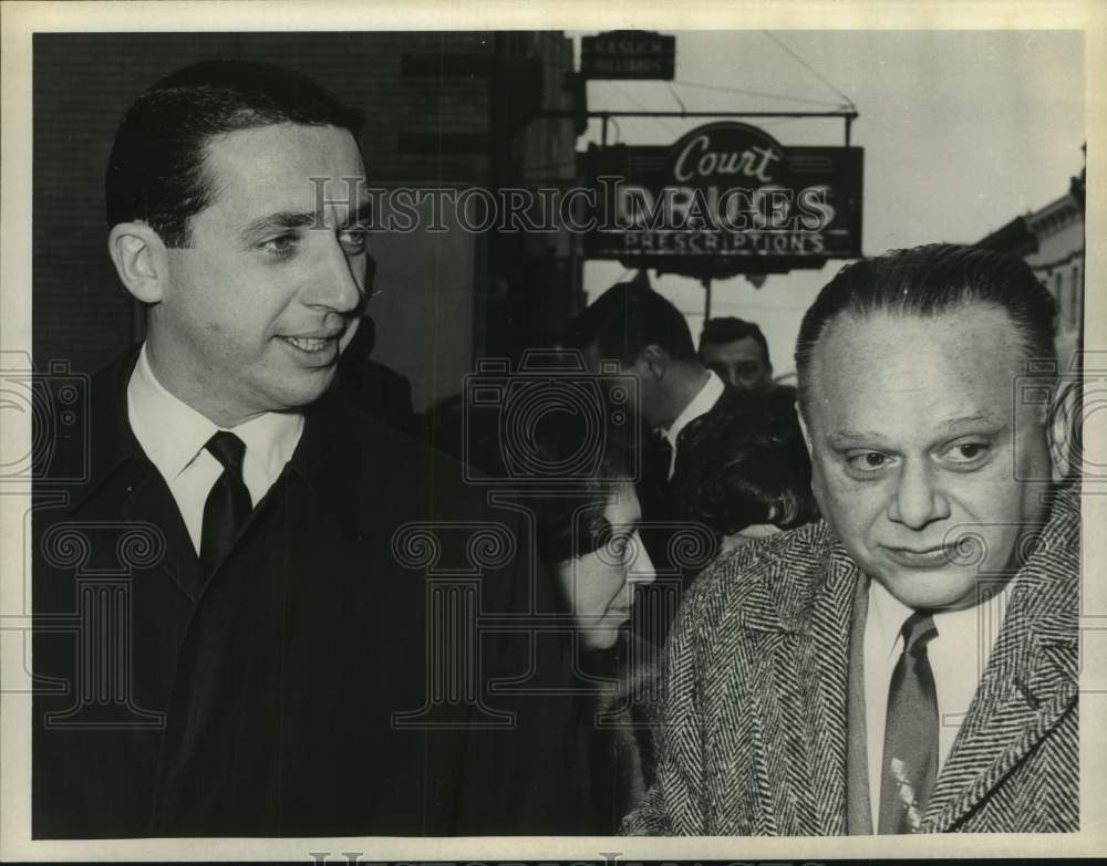 1967 Press Photo Michael Liuni (right) and Leonard N Tare walk outside