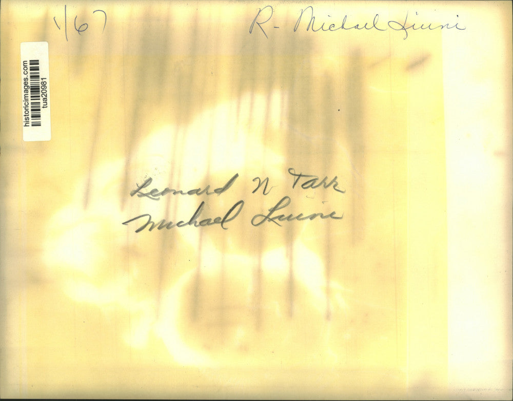 1967 Press Photo Michael Liuni (right) and Leonard N Tare walk outside