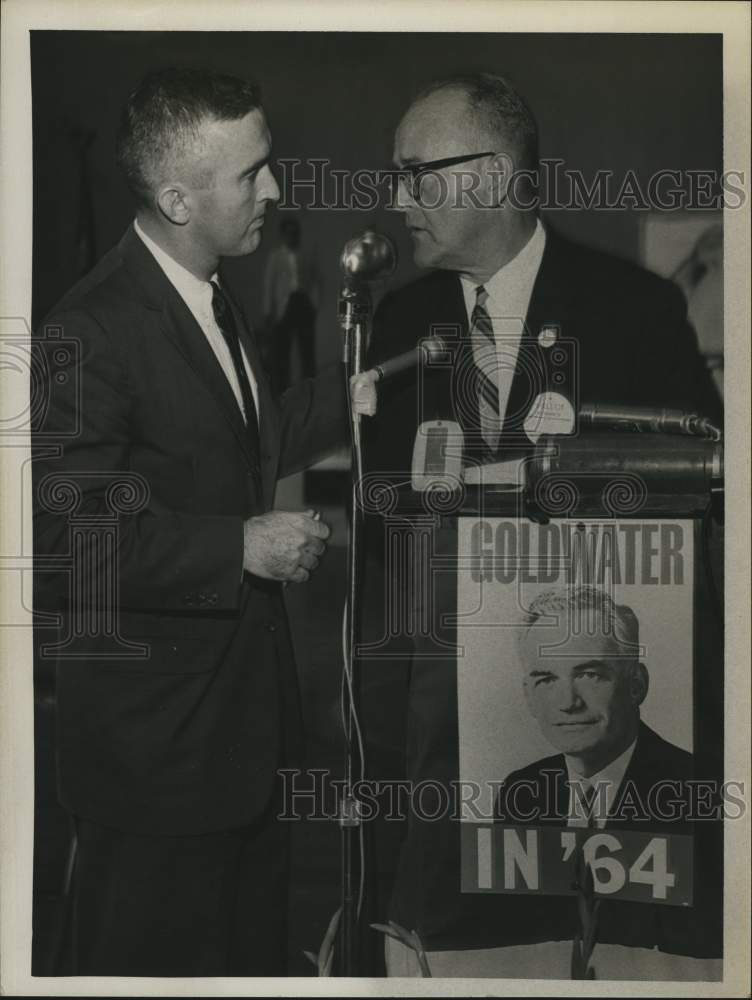 Load image into Gallery viewer, 1964 Press Photo Charles F Rice talks with Edwin Waterman, behind podium
