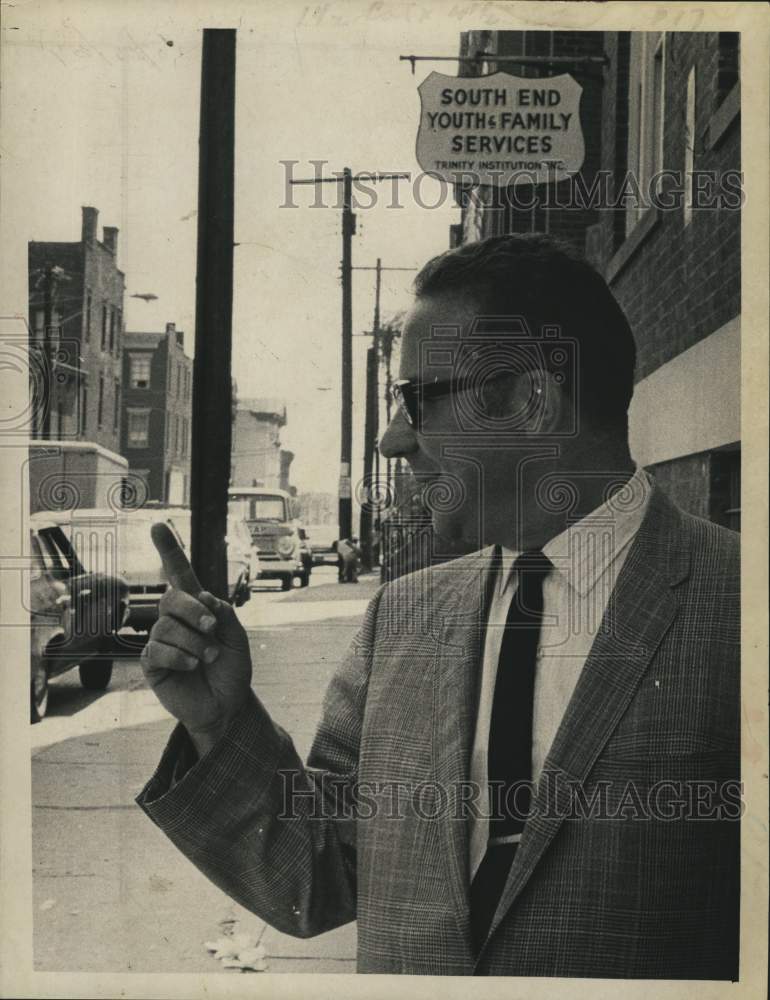 Load image into Gallery viewer, 1969 Press Photo Michael Nardolillo, director of Trinity Institution outside
