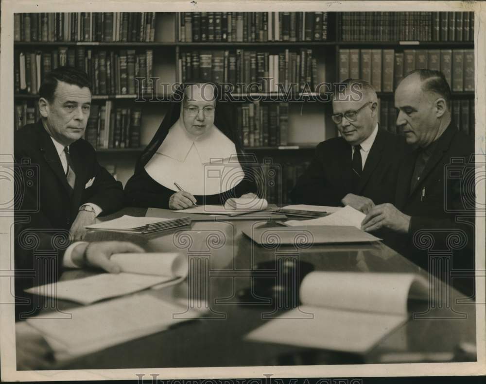 1963 Press Photo Board members sign contracts at St Peter's Hospital, Albany, NY
