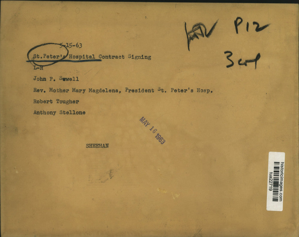 1963 Press Photo Board members sign contracts at St Peter's Hospital, Albany, NY