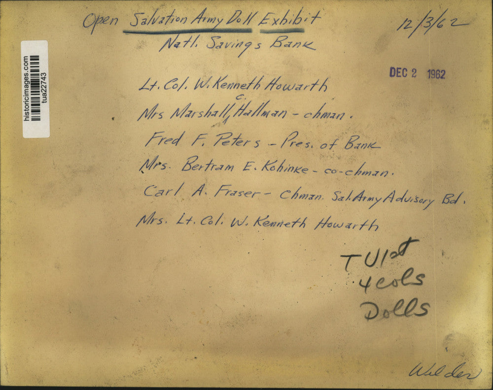 1962 Press Photo People look at open Salvation Army Doll Exhibit at Savings Bank