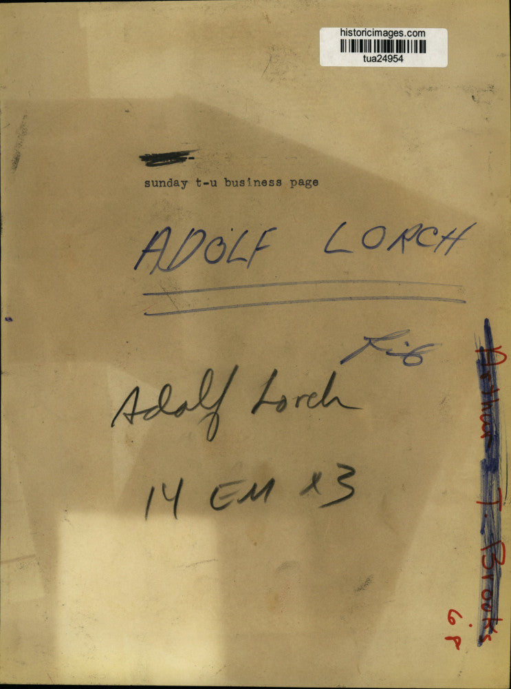 1968 Press Photo Adolf Lorch sits behind desk and talks on the telephone