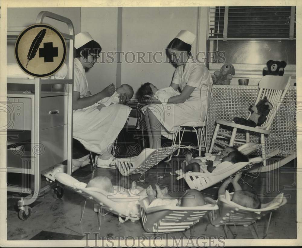 1966 Press Photo Nurses care for infants at St. Catherine Infant Home, New York