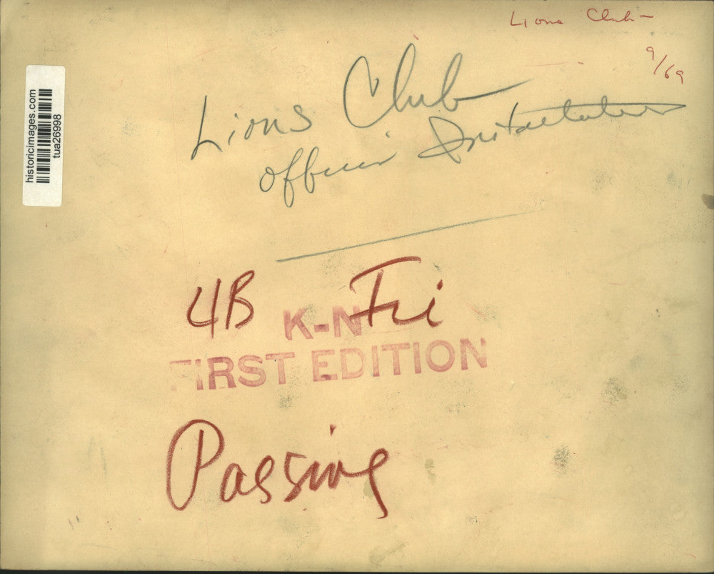 1969 Press Photo Lions Club officials pose with bell at ceremony in New York