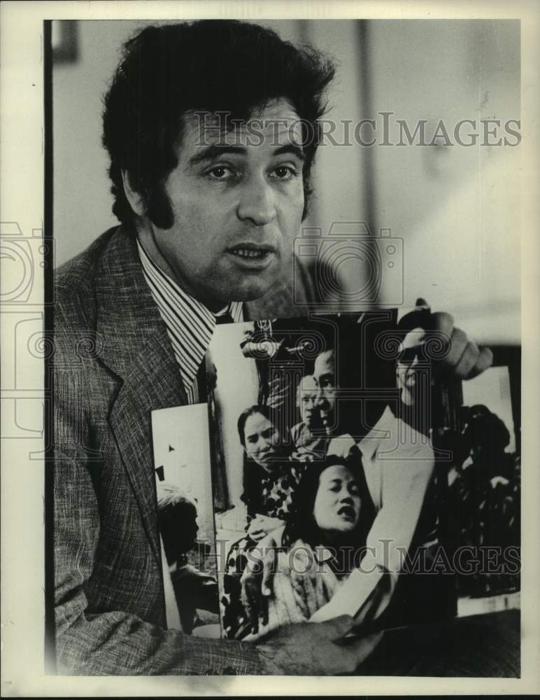 1973 Press Photo Don Luce shows photographs in New York - tua27827- Historic Images