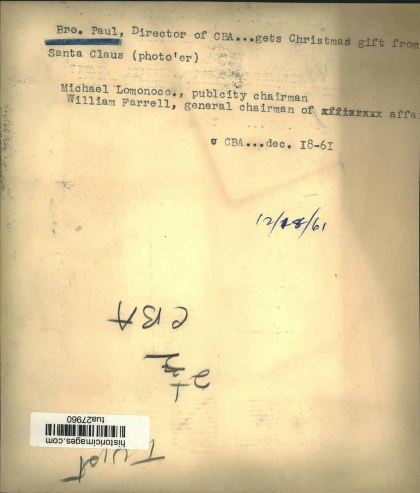 1961 Press Photo Brother Paul, Director of CBA, receives Christmas gift