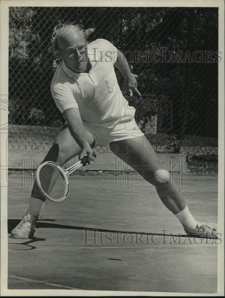 Load image into Gallery viewer, 1970 Press Photo Claude Schoenlank, Tri County Tennis singles champ hits shot
