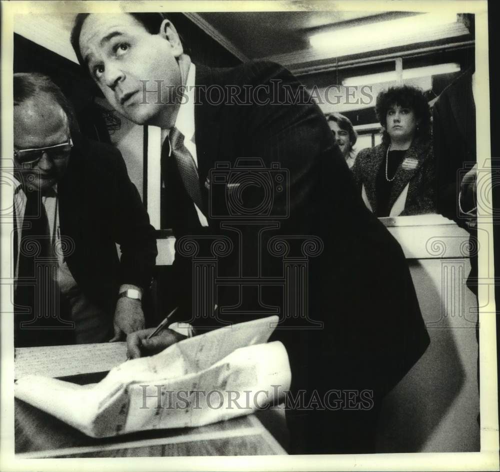 Press Photo Bob Signoracci, 6th Ward Alderman, checks ballots, Cohoes, New York- Historic Images