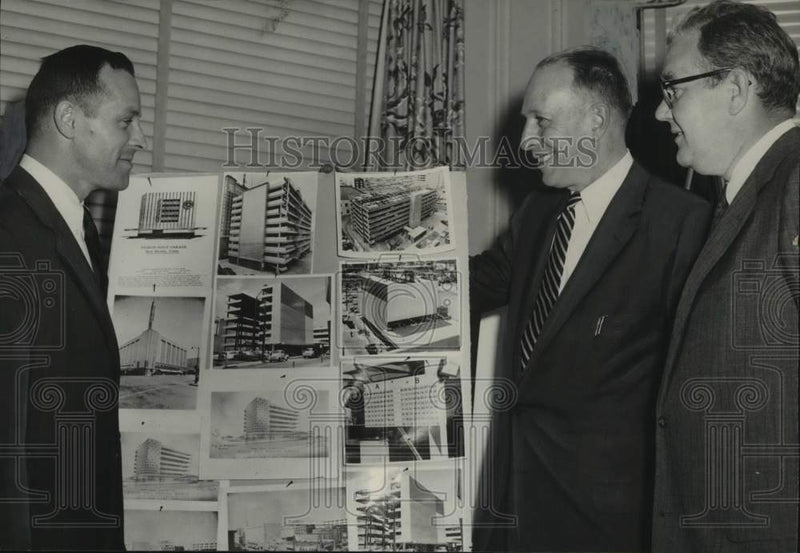 Load image into Gallery viewer, 1957 Press Photo Officials discuss parking garage planned for Albany, New York
