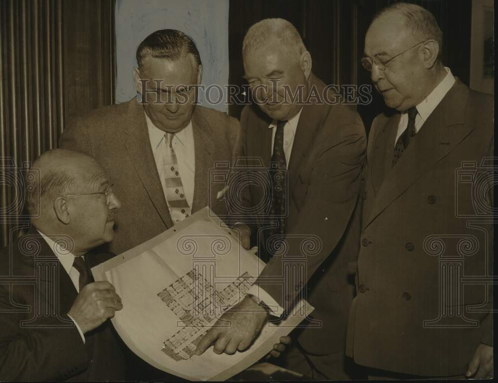 1956 Press Photo Officials look over Memorial Hospital blueprints in Albany, NY