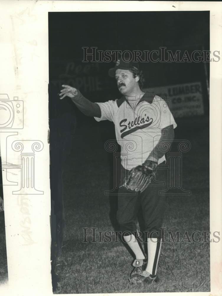 Press Photo Unidentified baseball player wearing a &quot;Stella&#39;s&quot; uniform throws- Historic Images